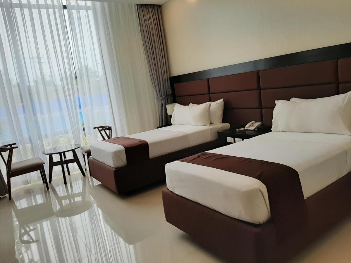 Winrich Hotel Мактан Экстерьер фото
